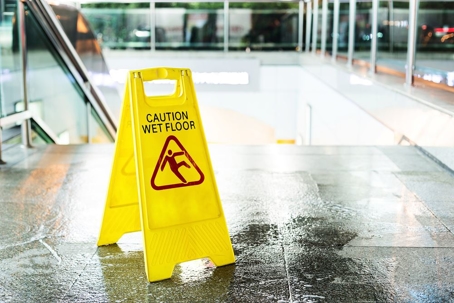 yellow wet floor sign