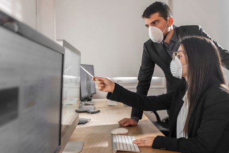 Business workers wear masks to protect and take care of their health.