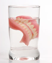 Dentures in glass