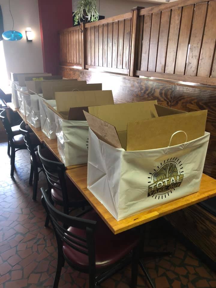 Boxes of food for the Sentara staff members.