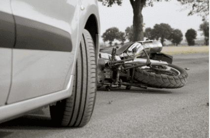 Motorcycle hit by a car